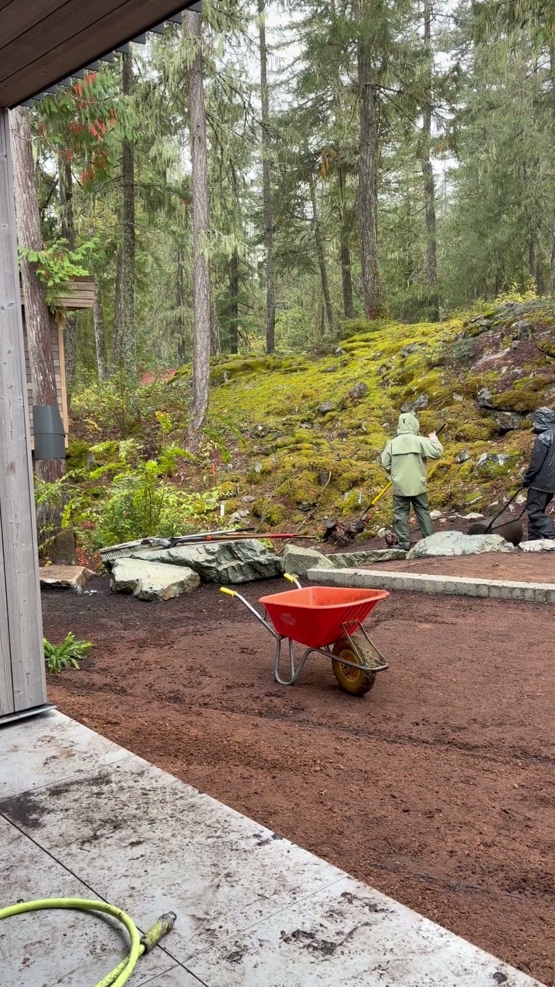 Prepared soil and site work before moss installation in Whistler, BC